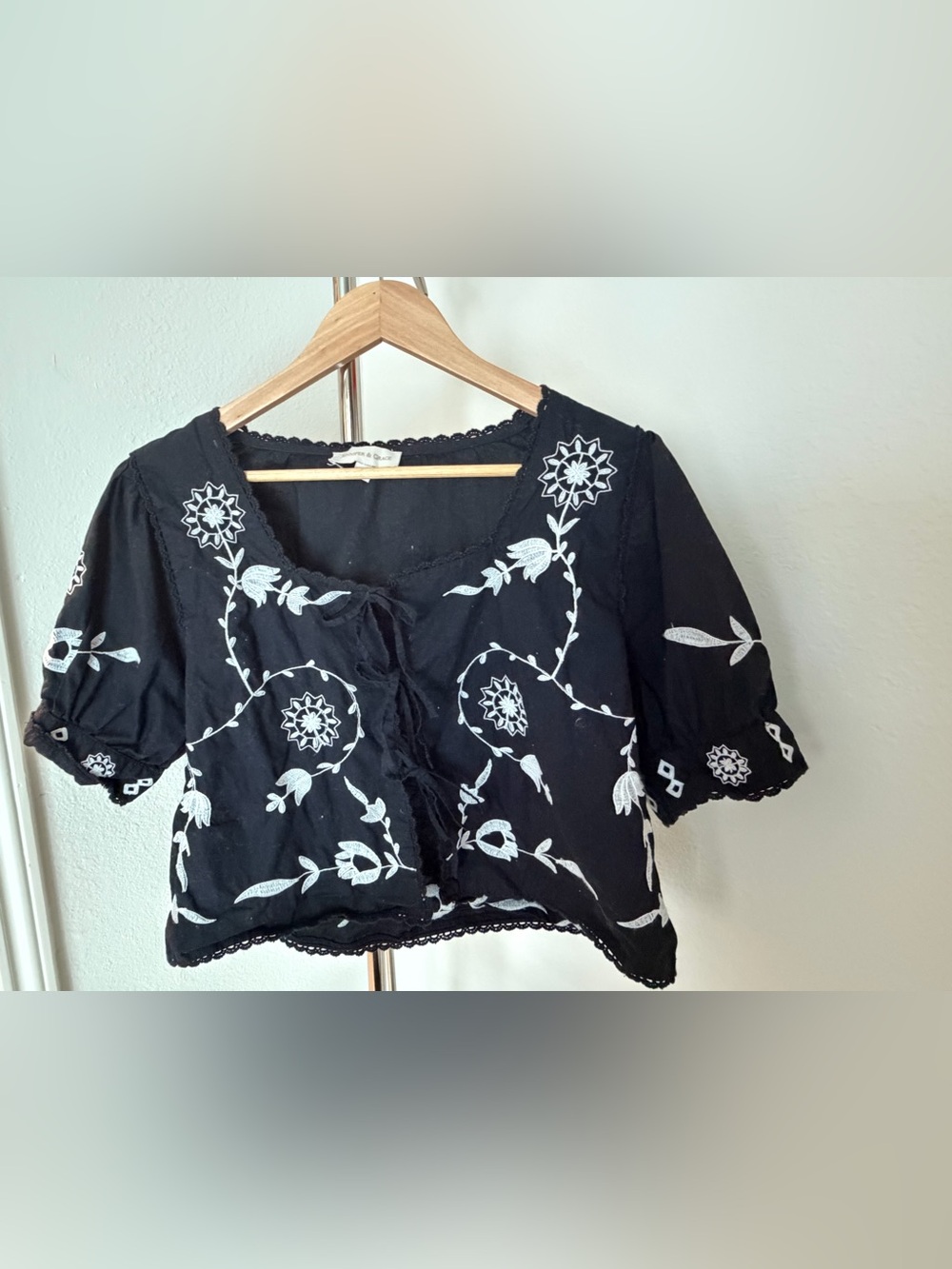 Black Embroidered Tie-Front Top with White Floral Stitching